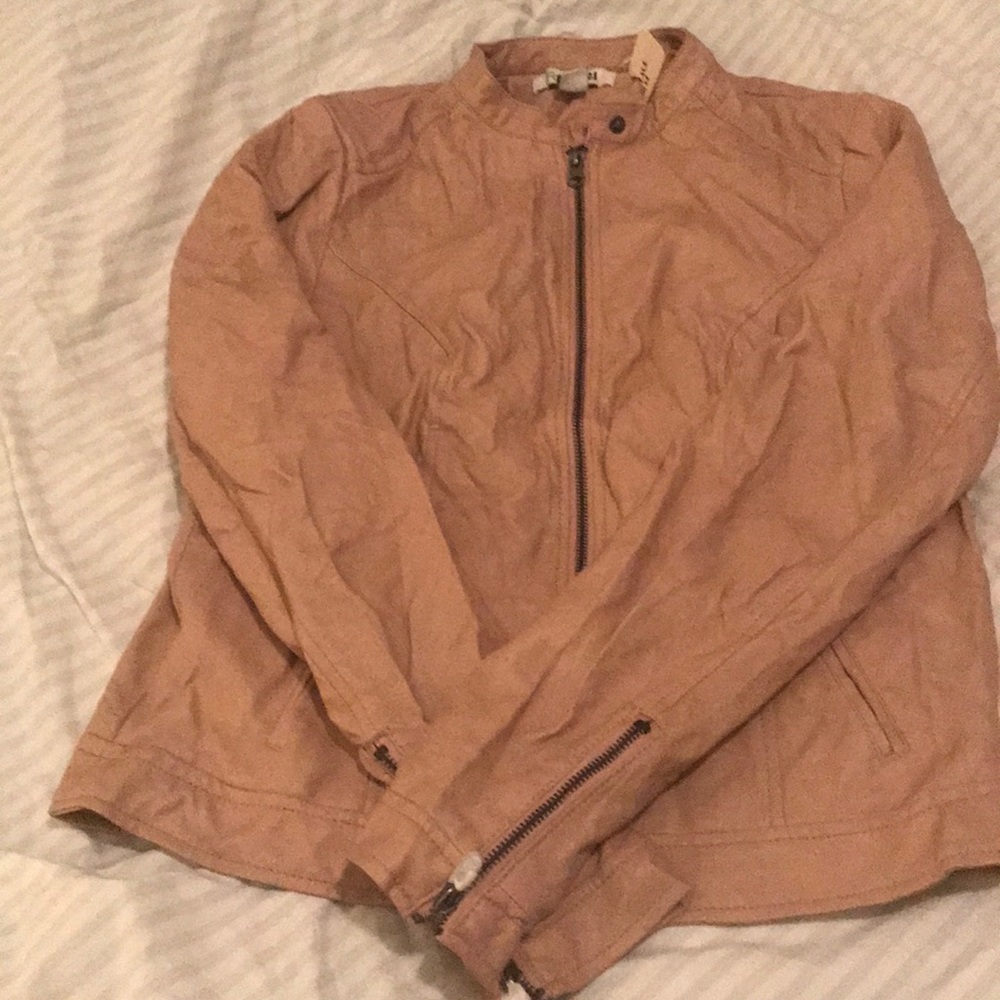 A faux leather mauve jacket.